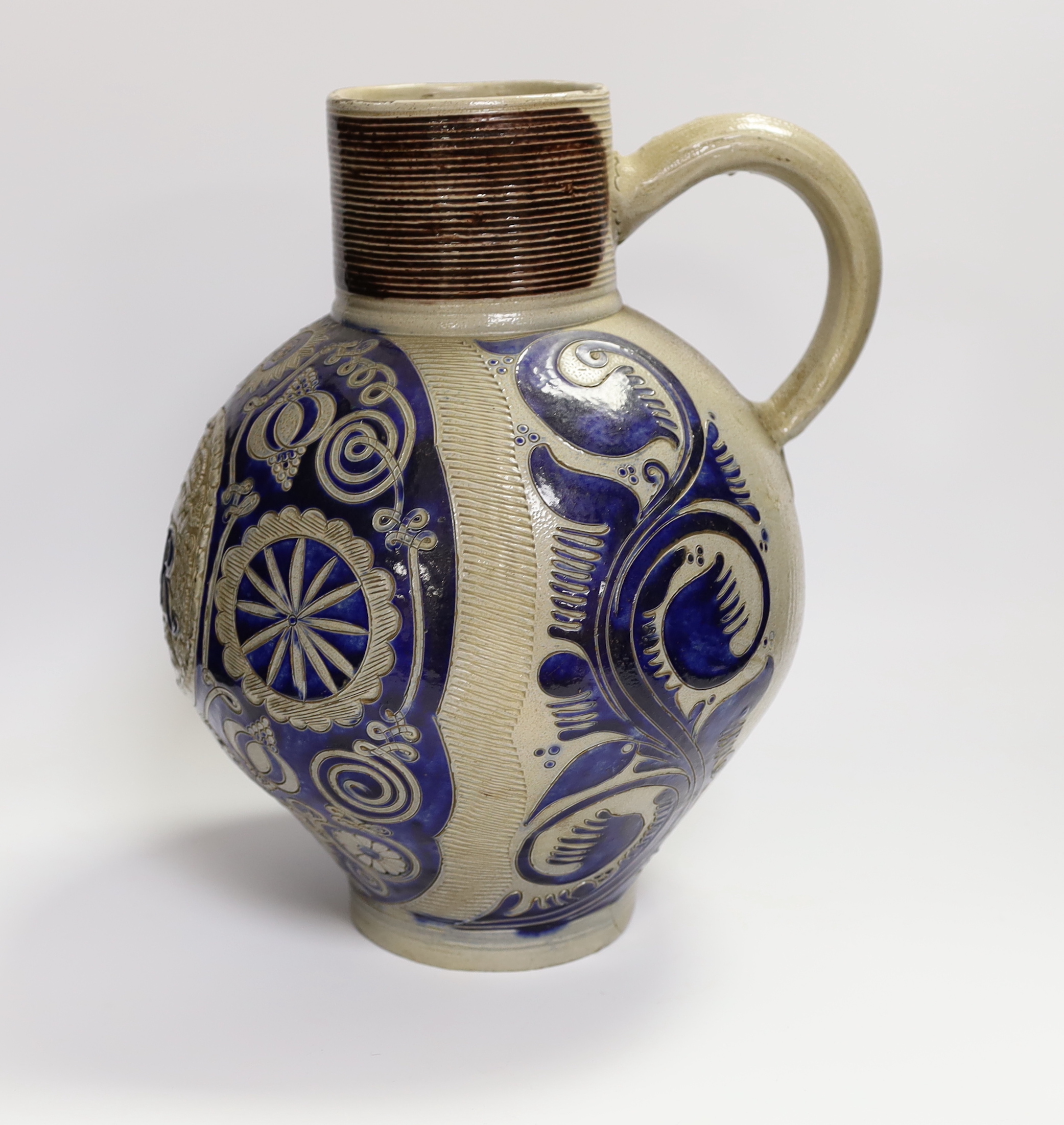 An 18th century German Westerwald stoneware jug with GR cypher, 32cm high